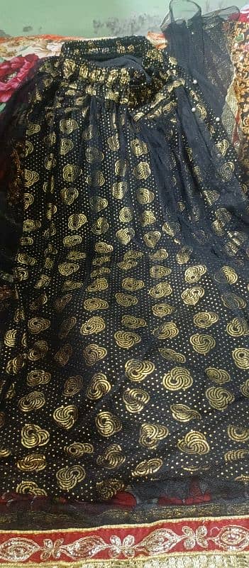 new lehnga in black colour only one time used 1