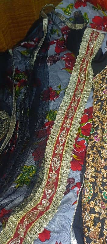 new lehnga in black colour only one time used 4