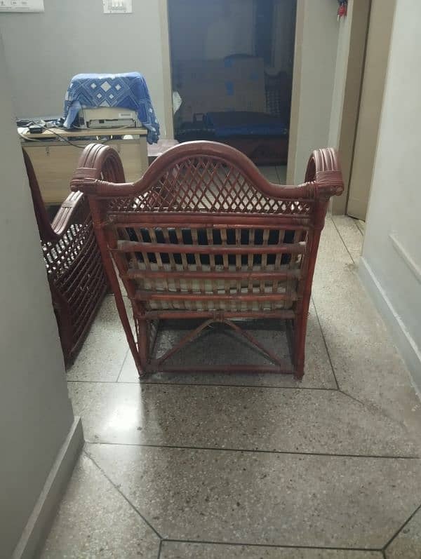 cane sofa 3+1+1 seated with one cane table 1