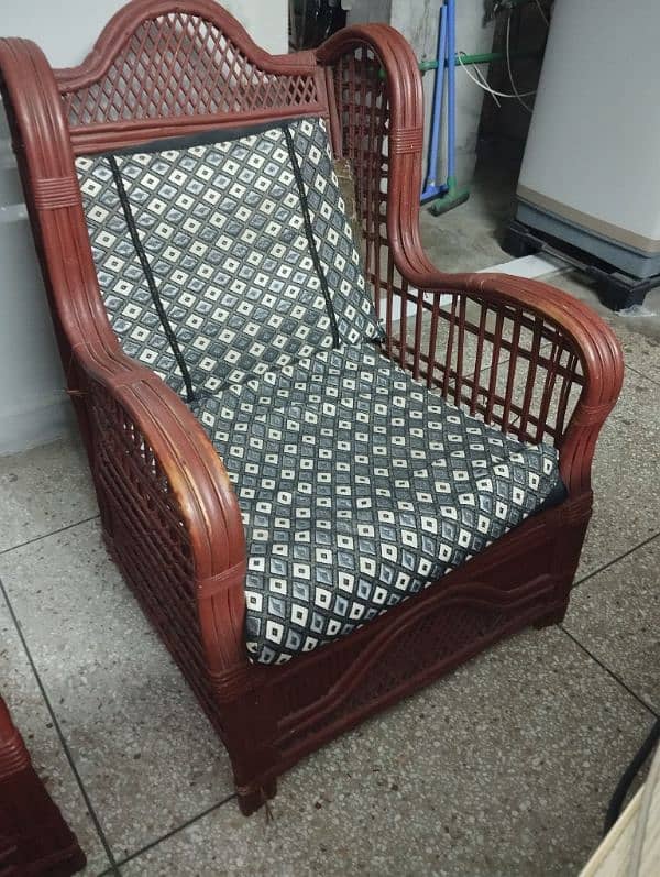 cane sofa 3+1+1 seated with one cane table 2