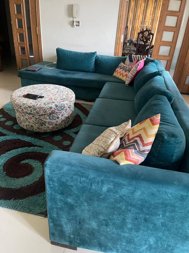 9 seater L shaped sofa with round puffy 1