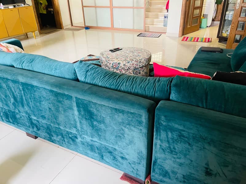 9 seater L shaped sofa with round puffy 4