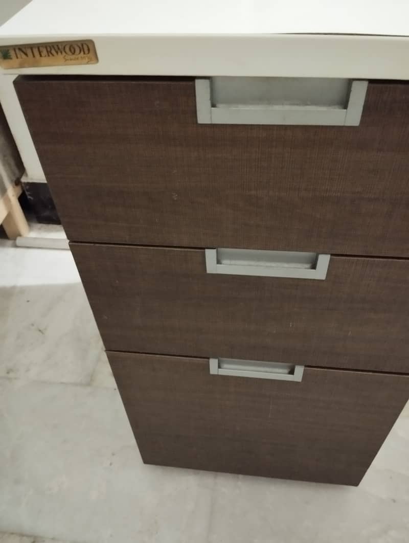 Interwood table defective 7
