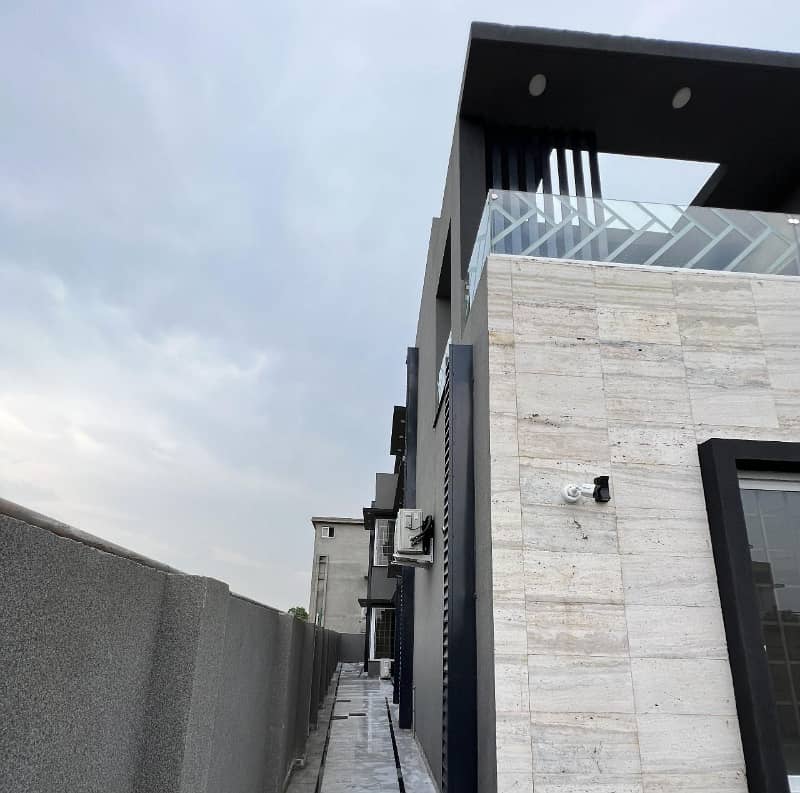 Dha 24 Marla designer house double unit hot location 5 beds 3