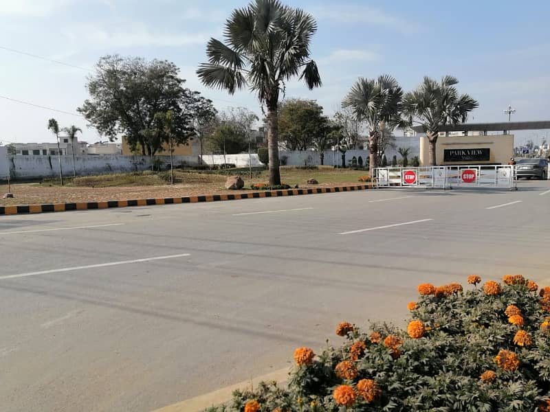 All Dues Clear 1 Kanal Plot Is Available For Sale 40ft Road Facing, Near To The Main Boulevard And Commercial Area Of The Society 2