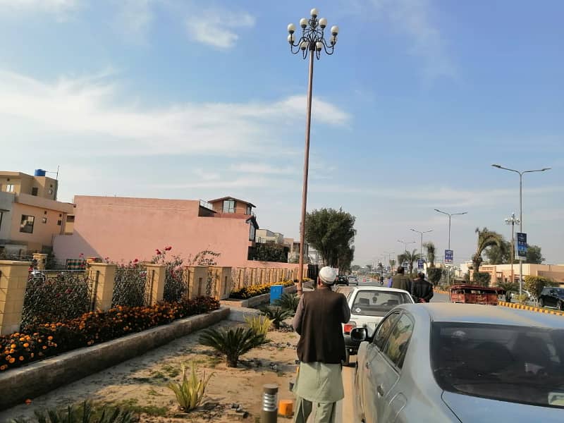 All Dues Clear 1 Kanal Plot Is Available For Sale 40ft Road Facing, Near To The Main Boulevard And Commercial Area Of The Society 5