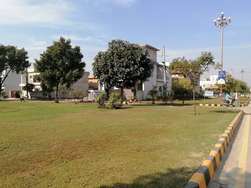 All Dues Clear 1 Kanal Plot Is Available For Sale 40ft Road Facing, Near To The Main Boulevard And Commercial Area Of The Society 19