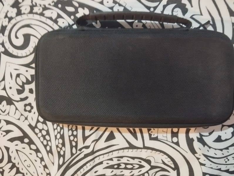 nintendo switch with cover case and games 4