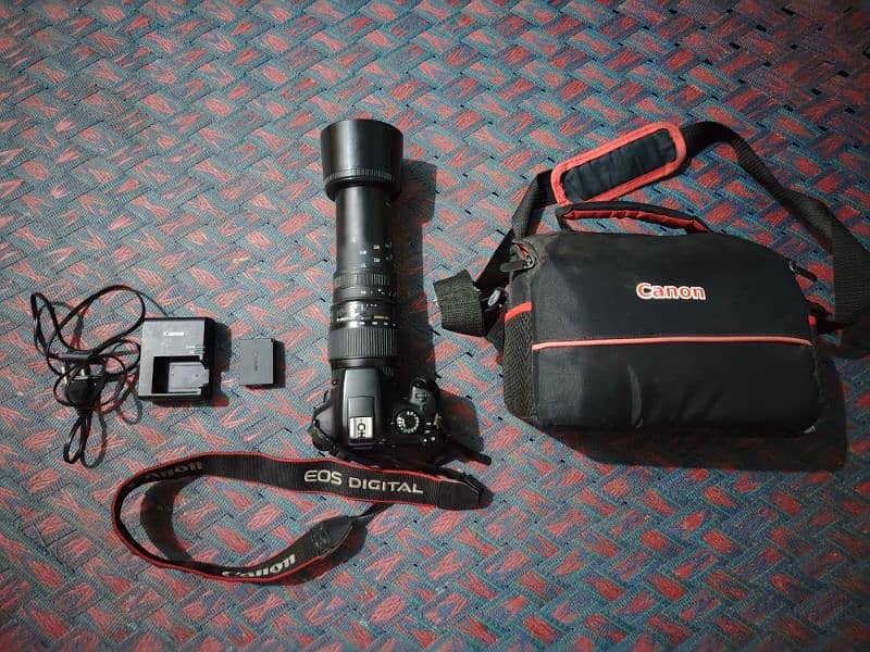 Canon 1300d wifi dslr camera with sigma 70-300mm lens and accessories. 0