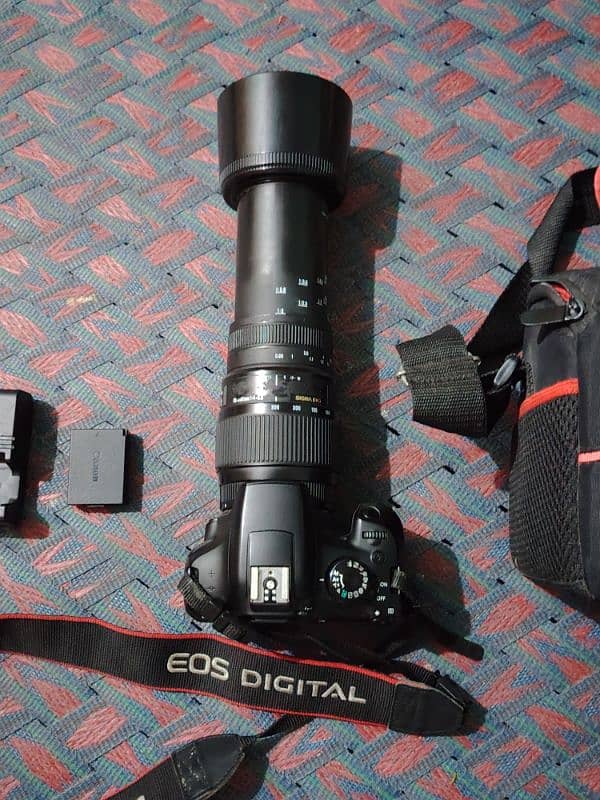 Canon 1300d wifi dslr camera with sigma 70-300mm lens and accessories. 1