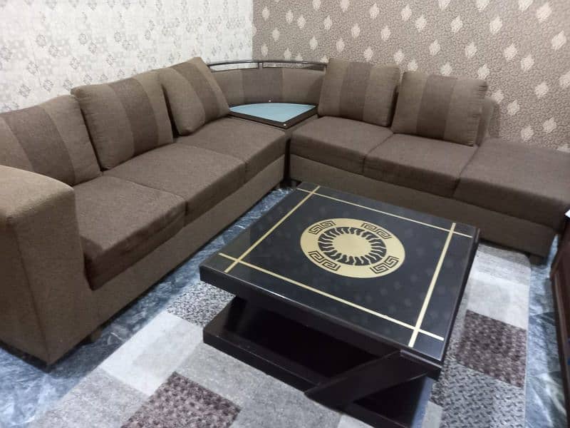 L SHAPED SOFA WITH GLASS TABLE 0