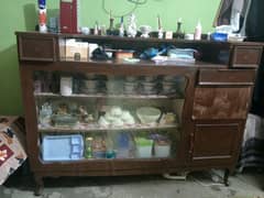 vintage display cabinet or a sideboard.
