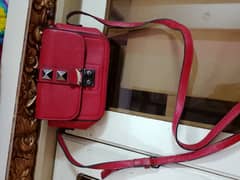 beautiful red color hand bag
