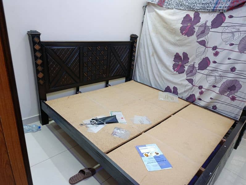 neat and clean bed with side table 1