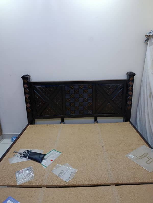 neat and clean bed with side table 4