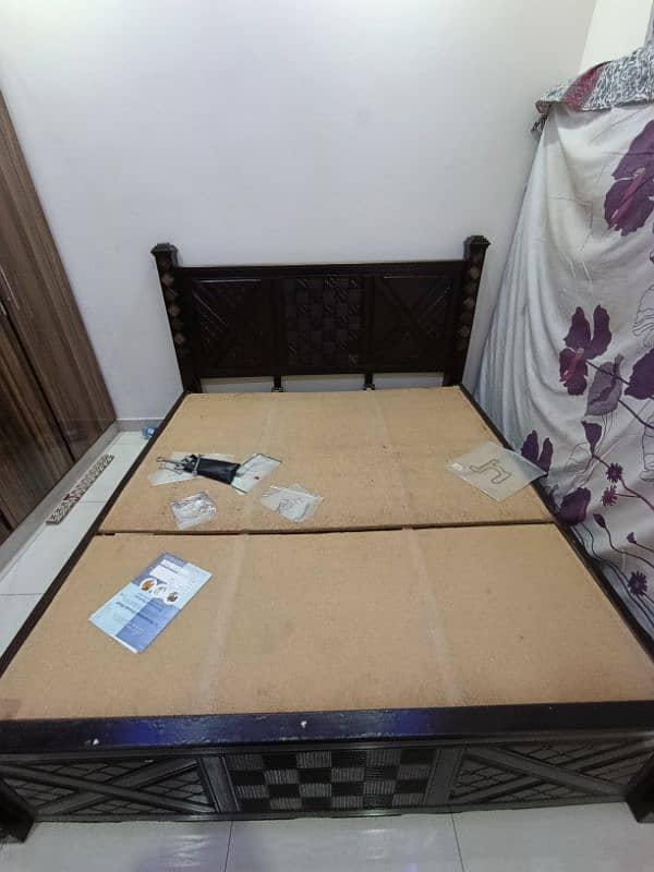 neat and clean bed with side table 5