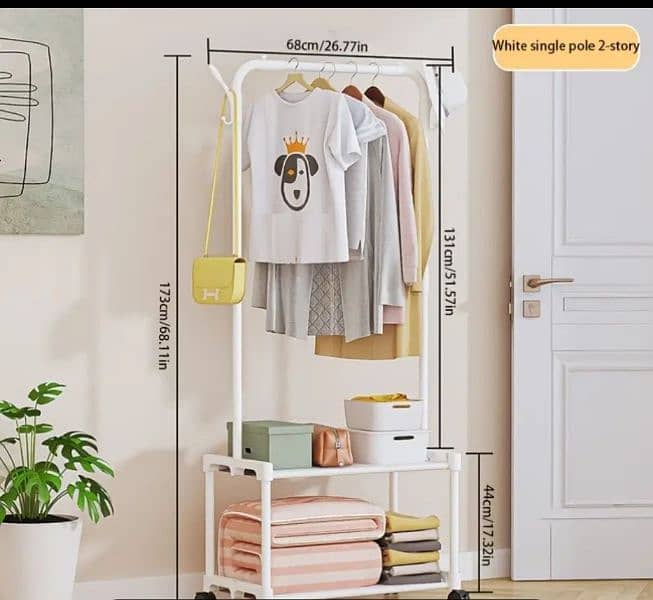 metal clotheses rack 360 degree rotate. indoor 1
