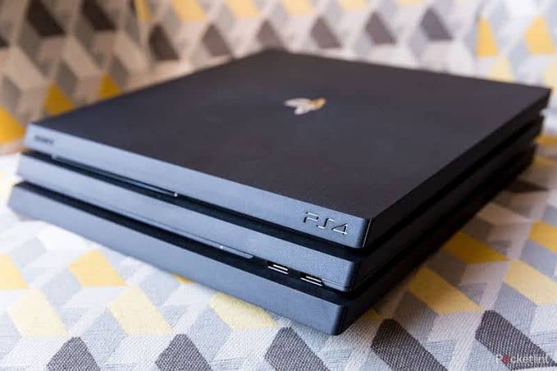 Playstation PS4 Pro 1TB with 2 controllers and 3 games 0