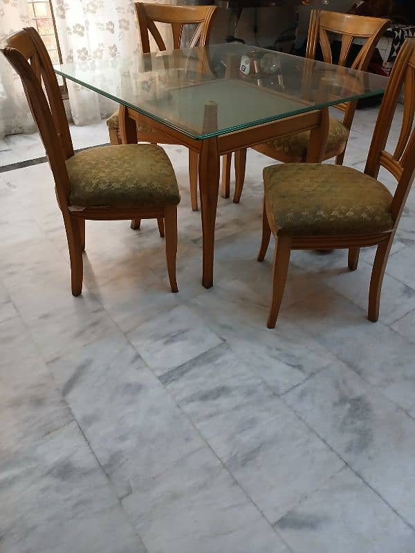 wooden dinning table with 4 chairs 0