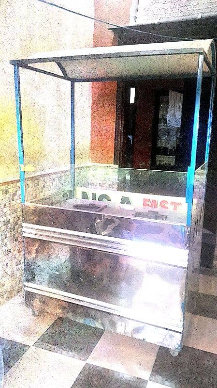 fast food counter with 2 stove Place available for sale 0