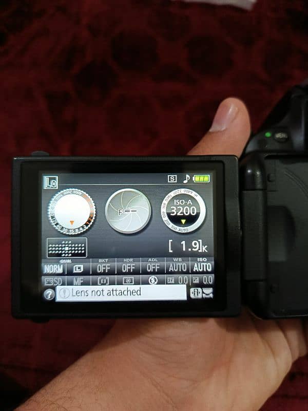 Nikon D5200 with 18-55mm lens + SB 400 Speedlight flash + 16 gb Card 4