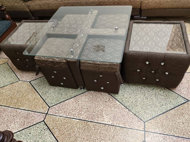 5 seater sofa set and center table with four sitting stools 4