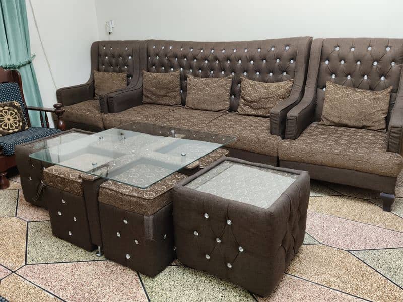 5 seater sofa set and center table with four sitting stools 7