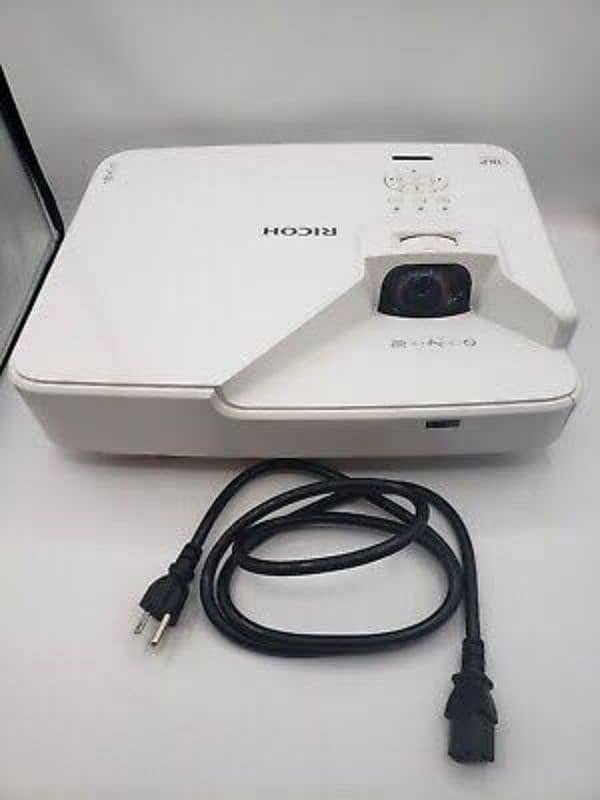 Laser Ricoh Ultra Short HD Projector for Home, Office & Schools 0