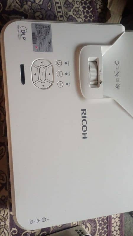 Laser Ricoh Ultra Short HD Projector for Home, Office & Schools 1