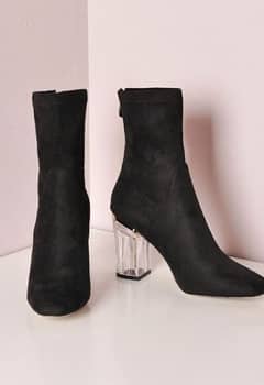 Stunning clear block heels for a bold, modern touch  Side zipper