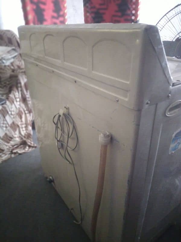 s. b washing machine and dryer colour off waith. condition neat and clen 2