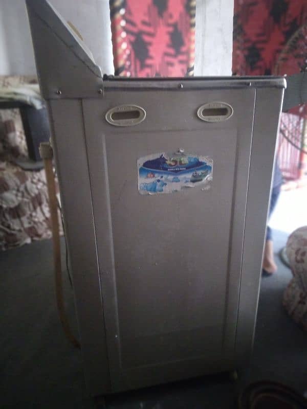 s. b washing machine and dryer colour off waith. condition neat and clen 3