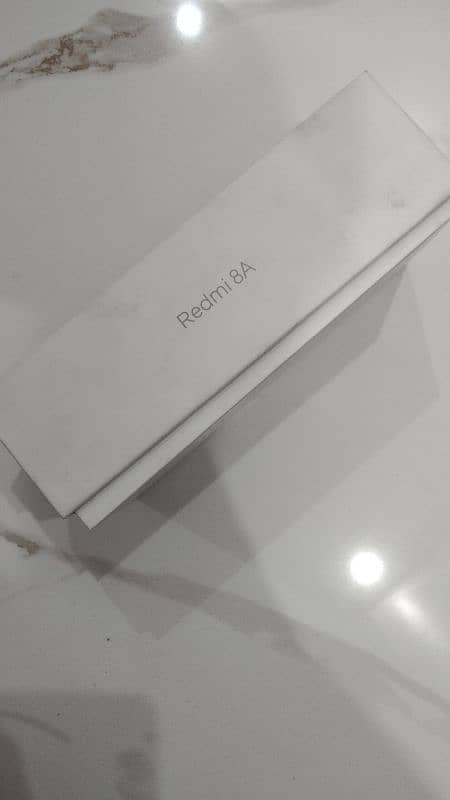 Redmi 8A (new condition) with box ,charger,wire 1
