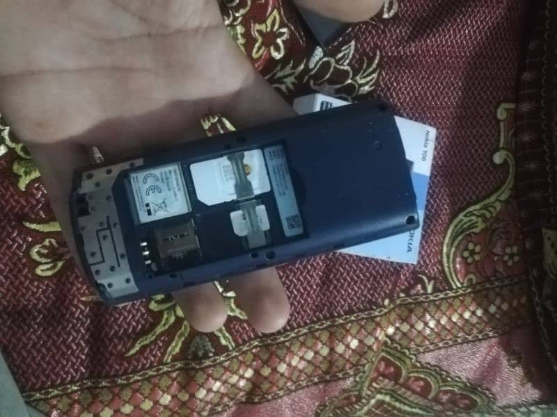 nokia 106 bast mobile call 1 hand use 7