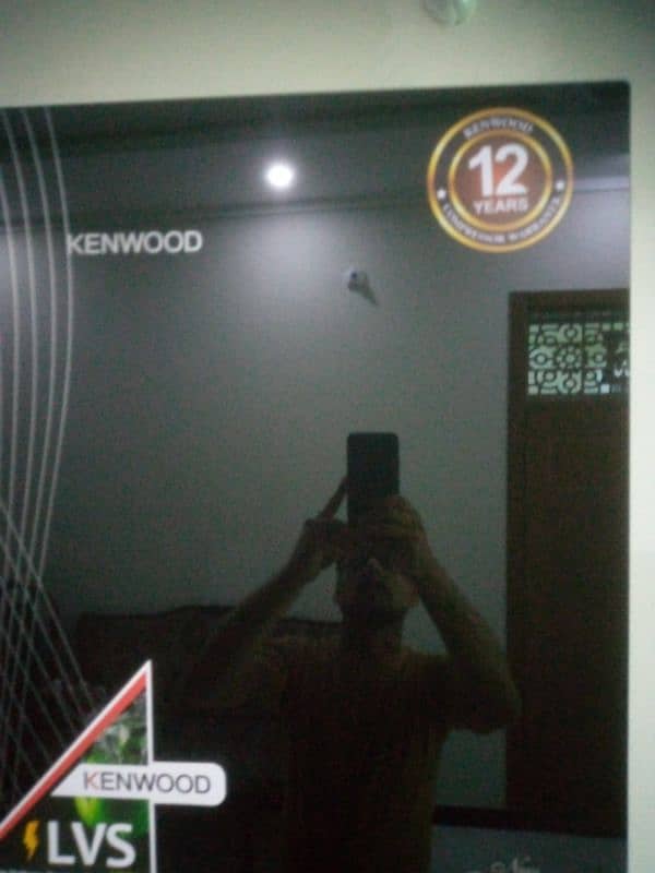 Kenwood large size. 12 year compraser verentty. colour shade blac 12