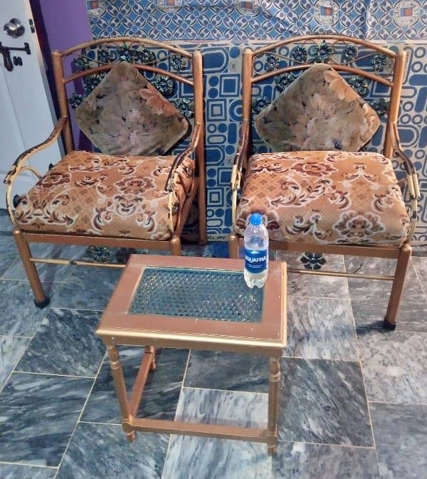 two chairs and one table 0