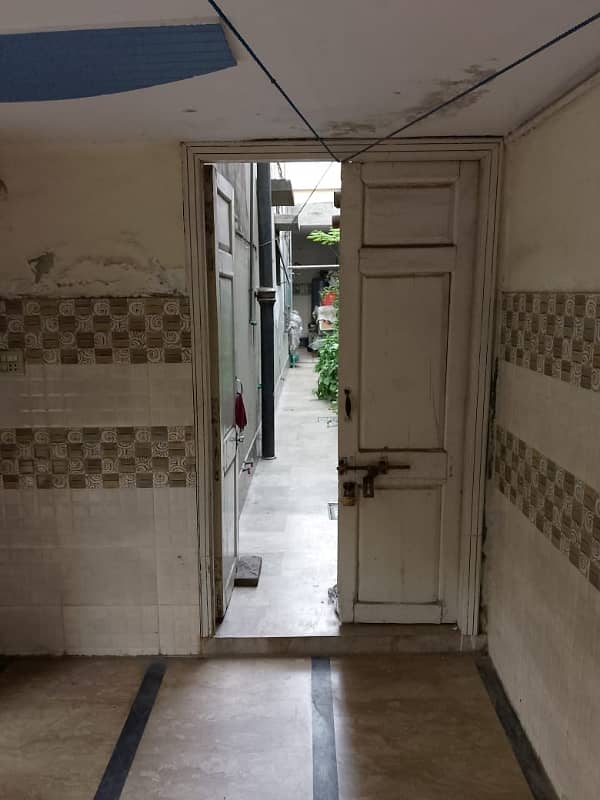 10.25 Marla Used & well maintained House for sale with 1 Marla extra land included.  Located at the prime location of Chowk Yateem Khana.  Neat & Clean House. 4
