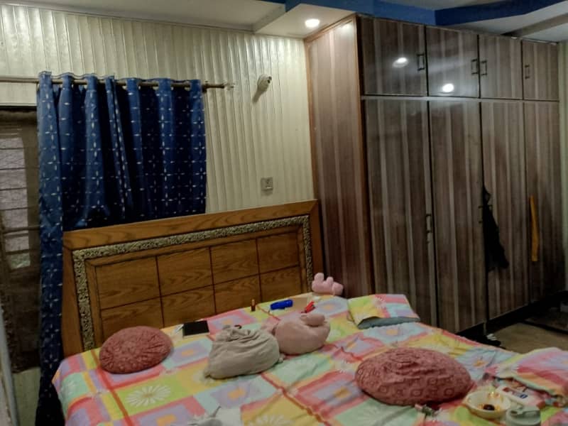 10.25 Marla Used & well maintained House for sale with 1 Marla extra land included.  Located at the prime location of Chowk Yateem Khana.  Neat & Clean House. 6
