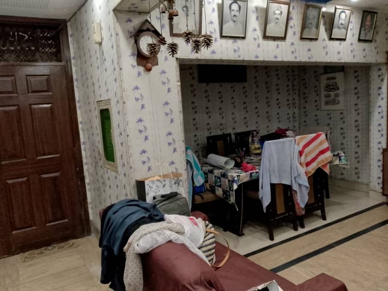 10.25 Marla Used & well maintained House for sale with 1 Marla extra land included.  Located at the prime location of Chowk Yateem Khana.  Neat & Clean House. 10