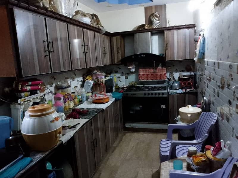 10.25 Marla Used & well maintained House for sale with 1 Marla extra land included.  Located at the prime location of Chowk Yateem Khana.  Neat & Clean House. 13