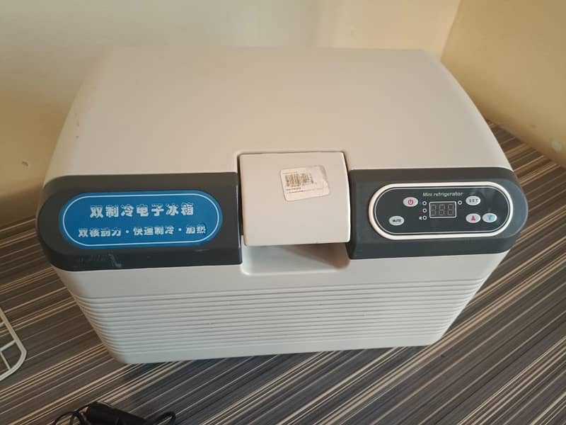 Portable Mini Fridge | Dual Mode Cooling & Heating | Car & Home Use 1