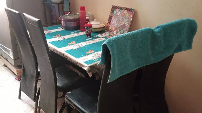 Glass table and Four Chairs 0
