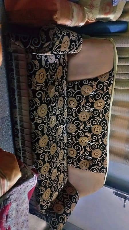black& golden colour with sofa cover in best condition 0