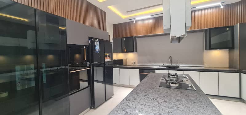 F-11/2: A Brand New Masterpiece of EleganceFully-Furnished 666 Yards Residence, Dimension = 50120, Margalla-Facing, High-End Construction, 9 Luxurious Bedrooms, A Spacious Full Basement. Price: 32.50 Crores. 9