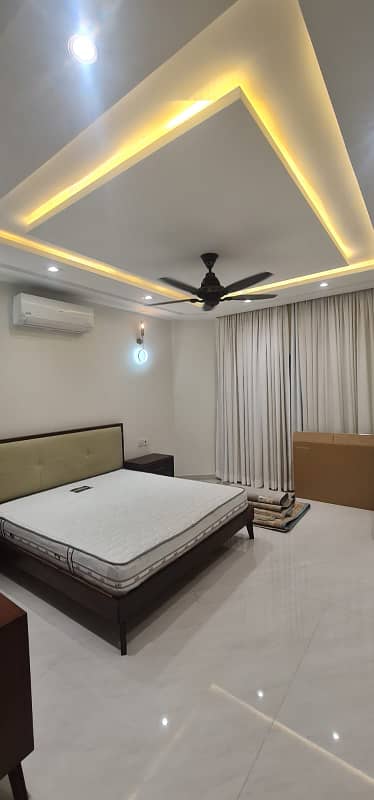 F-11/2: A Brand New Masterpiece of EleganceFully-Furnished 666 Yards Residence, Dimension = 50120, Margalla-Facing, High-End Construction, 9 Luxurious Bedrooms, A Spacious Full Basement. Price: 32.50 Crores. 12