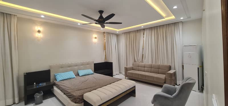 F-11/2: A Brand New Masterpiece of EleganceFully-Furnished 666 Yards Residence, Dimension = 50120, Margalla-Facing, High-End Construction, 9 Luxurious Bedrooms, A Spacious Full Basement. Price: 32.50 Crores. 13