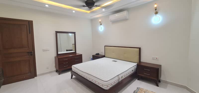 F-11/2: A Brand New Masterpiece of EleganceFully-Furnished 666 Yards Residence, Dimension = 50120, Margalla-Facing, High-End Construction, 9 Luxurious Bedrooms, A Spacious Full Basement. Price: 32.50 Crores. 14