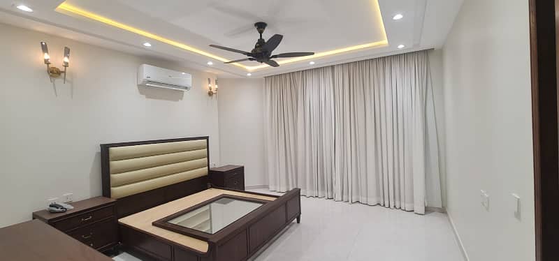 F-11/2: A Brand New Masterpiece of EleganceFully-Furnished 666 Yards Residence, Dimension = 50120, Margalla-Facing, High-End Construction, 9 Luxurious Bedrooms, A Spacious Full Basement. Price: 32.50 Crores. 15