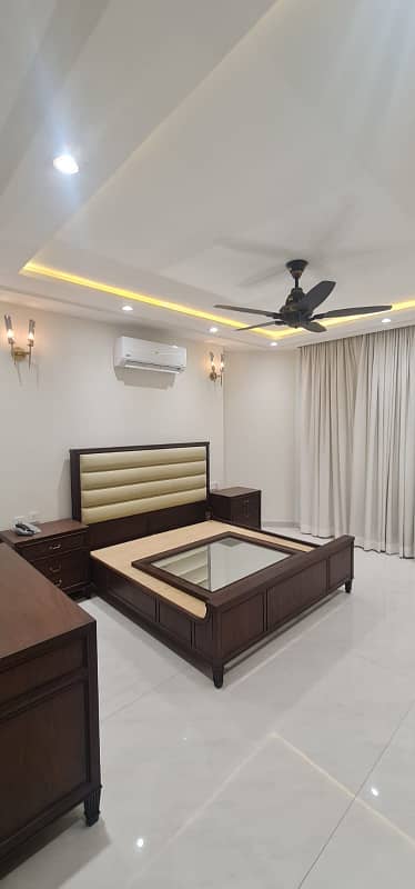 F-11/2: A Brand New Masterpiece of EleganceFully-Furnished 666 Yards Residence, Dimension = 50120, Margalla-Facing, High-End Construction, 9 Luxurious Bedrooms, A Spacious Full Basement. Price: 32.50 Crores. 16