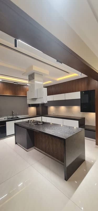 F-11/2: A Brand New Masterpiece of EleganceFully-Furnished 666 Yards Residence, Dimension = 50120, Margalla-Facing, High-End Construction, 9 Luxurious Bedrooms, A Spacious Full Basement. Price: 32.50 Crores. 27